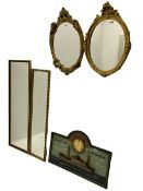 Three mid-20th century oval wall mirrors