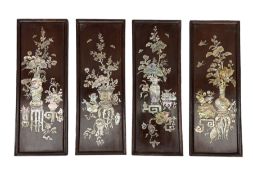 Set of four Oriental mother of pearl inlaid panels