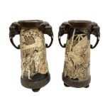 Pair of Bretby vases of tapering cylindrical form decorated with elephants