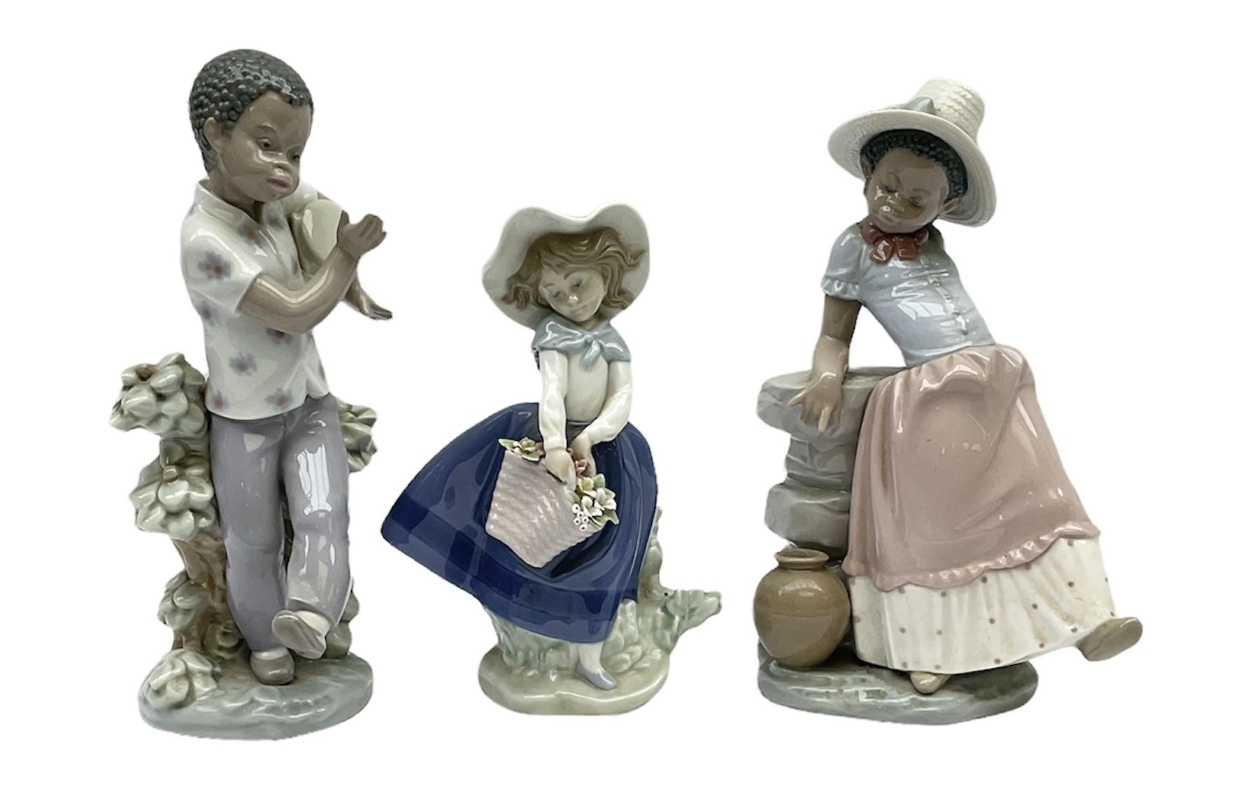 Pair of Lladro figures designed by Jose Roig