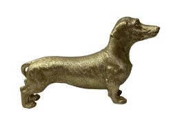 Composite metallic gold model of a Dachshund