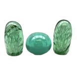 Pair of Victorian green glass dump paperweights with air bubble inclusions