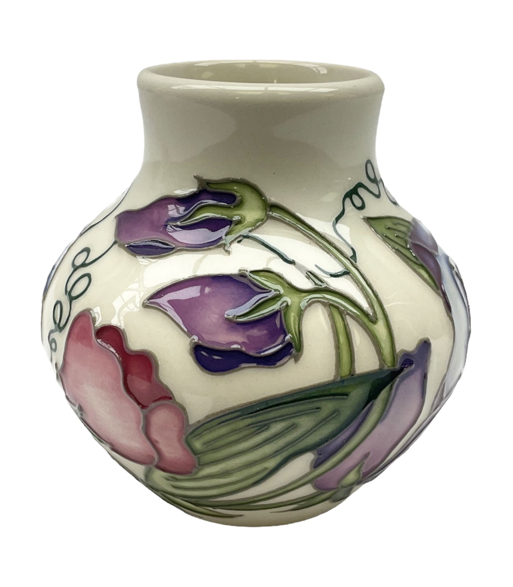 Moorcroft vase of squat form decorated in the Sweetness pattern by Nicola Slaney