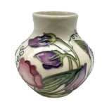 Moorcroft vase of squat form decorated in the Sweetness pattern by Nicola Slaney