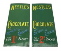 Two green enamel vending machine signs 'Nestle's Milk Chocolate the richest in cream'