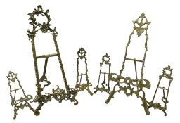 Collection of ornate brass easel picture stands