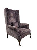 Early 20th century high wing back armchair