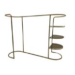 Brass shops display clothing rail