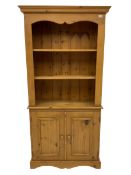 Solid pine open bookcase with two cupboards