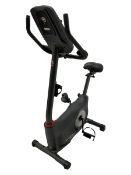 Schwinn 570U cycling type exercise machine with instruction manual and copy invoice dated 2019