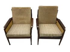 Pair of mid-20th century teak framed upholstered armchairs