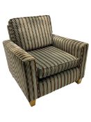 Peter Silk of Helmsley - armchair upholstered in stripe fabric