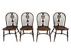 Four medium elm Windsor chairs
