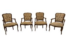 Set of four French style beech framed armchairs