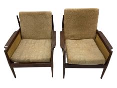 Pair of mid-20th century teak framed upholstered armchairs