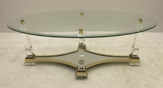 Classical style glass and brass oval coffee table