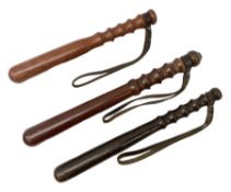 Three police turned hardwood truncheons comprising two patrol truncheons and WPC short truncheon (3)