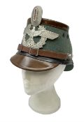 WW2 German rural police shako with helmet plate and liner; bears label 'Hans Romer Echt Fiber-Tschak