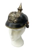 Imperial German Other Ranks style Pickelhaube helmet with white metal fire brigade badge to the cent