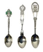 Three hallmarked silver shooting spoons including Royal Military College Rifle Club