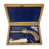 19th century percussion single barrel pocket pistol with 7cm screw-off barrel and walnut stock; appr