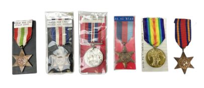 WW1 Victory Medal awarded to 6538 Pte. T. Chatburn Glouc. R. ; and five WW2 medals comprising War Me