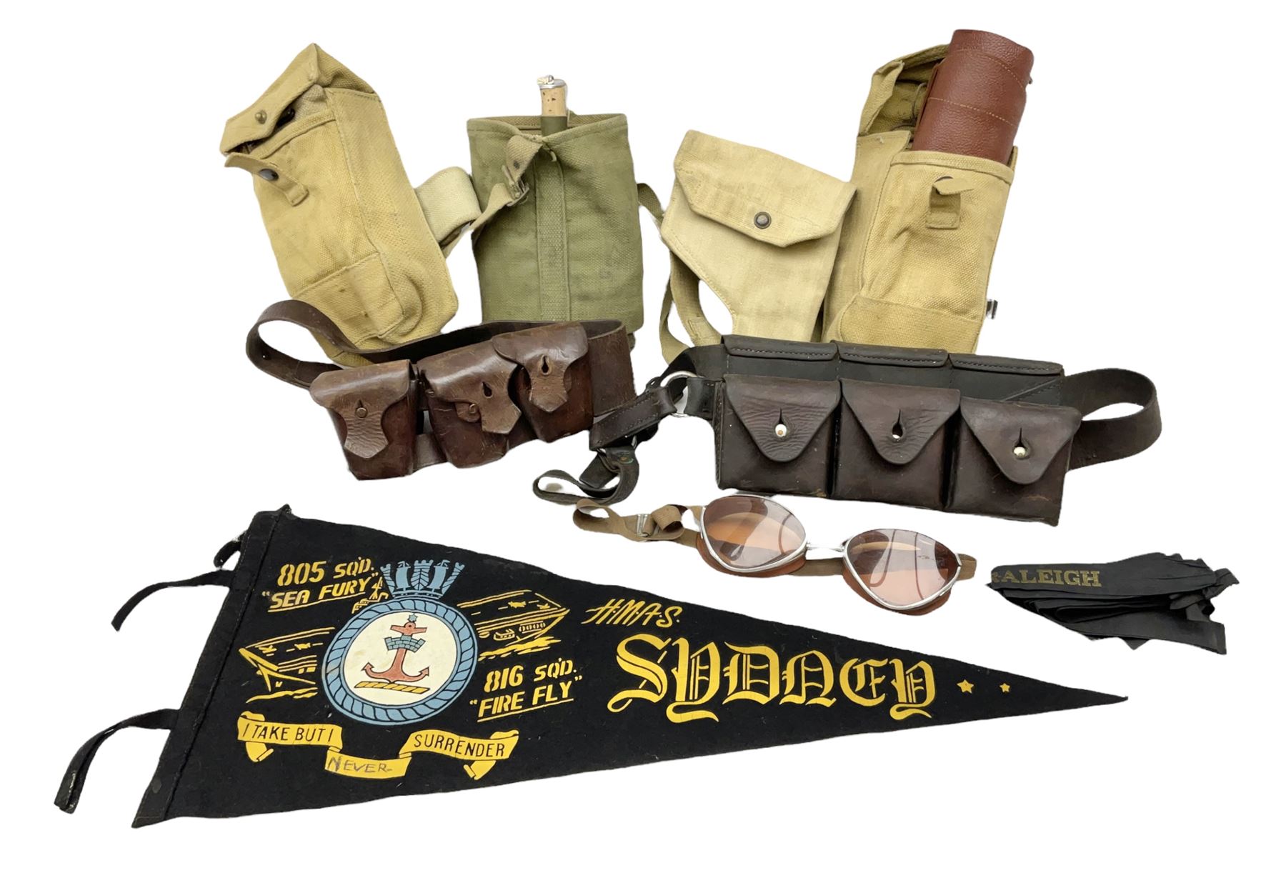 Swiss leather ammunition belt with six pouches containing empty clips; another leather ammunition be