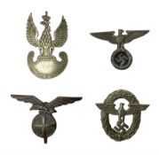 Three WW2 German visor cap badges comprising Police eagle