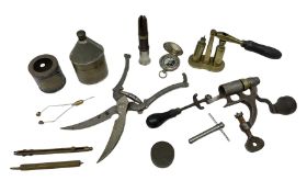 Miscellaneous shooting accessories including German Solingen game shears; Boss & Co tin of Rangoon O