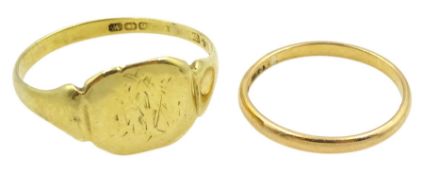 18ct gold signet ring and a 22ct gold wedding band