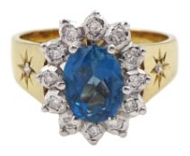 9ct gold oval blue topaz and round brilliant cut diamond cluster ring