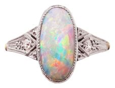 Gold and platinum single stone opal ring