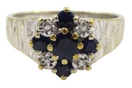 9ct white gold sapphire and diamond cluster ring with textured shoulders