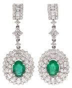 Pair of 18ct white gold oval cut emerald