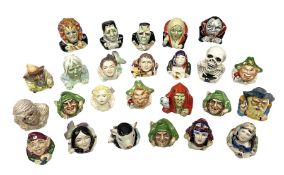 Twenty five Face Pots by Kevin Frances