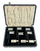 Cased set of six George V Amnora sandwich / canape flags in silver plated frames