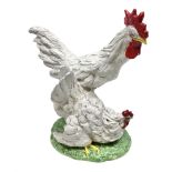 Italian pottery sculpture of a cockerel and hen
