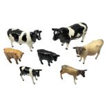 Seven Beswick cow figures