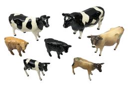 Seven Beswick cow figures