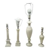 Four white hardstone table lamps with marble effect