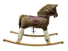 Modern plush covered rocking horse with inset eyes