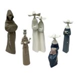 Three Lladro figures of nuns comprising Prayerful Moment no. 5500