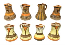 Eight Myott Son & Co hand painted jugs