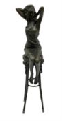 Art Deco style bronze figure of a lady seated on a stool