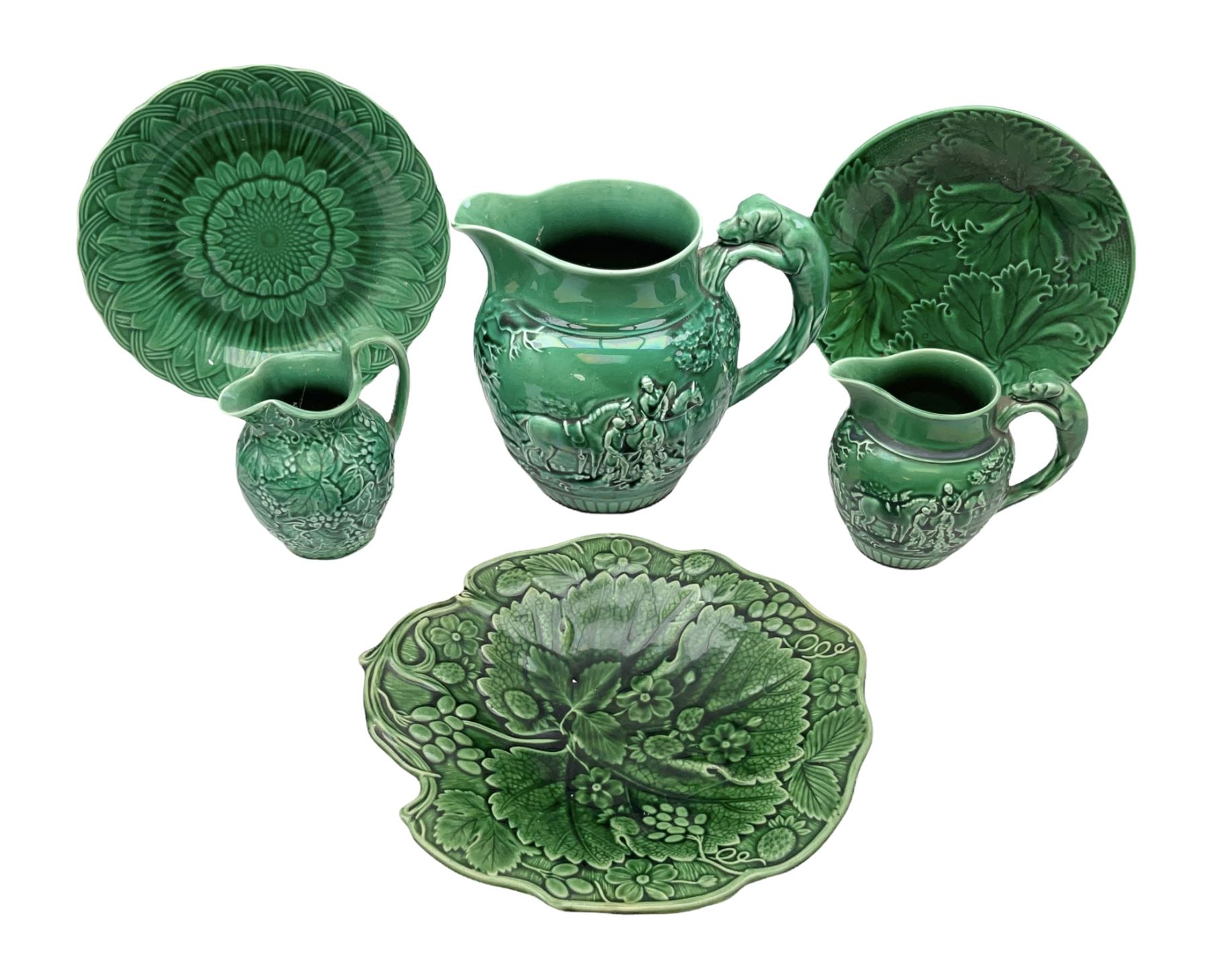 Three Wedgwood Of Etruria majolica jugs together with three majolica dishes