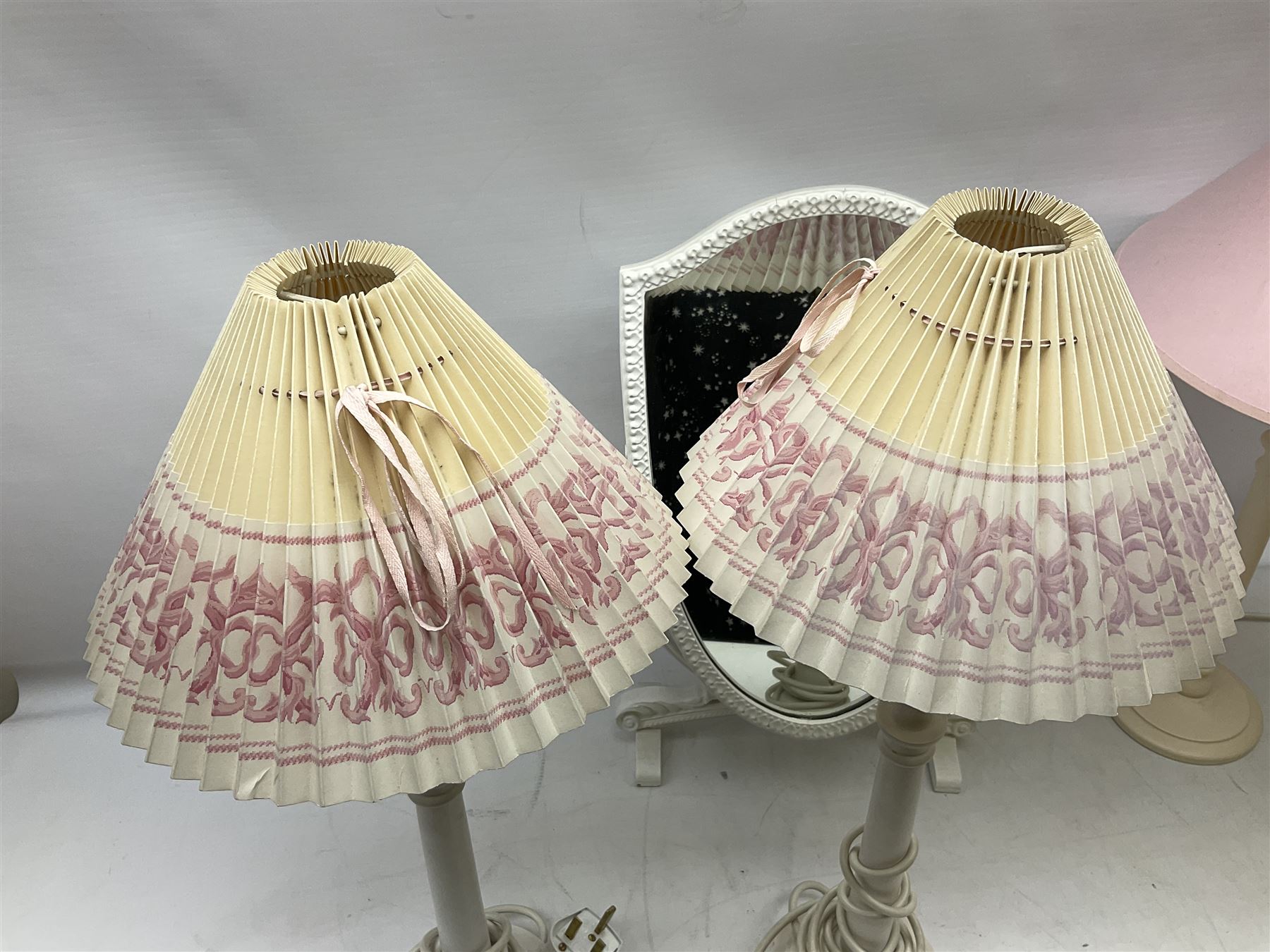 Four white / cream table lamps with pink shades and an ornate mirror of shield form - Image 9 of 9