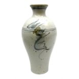 Studio pottery vase of baluster form with a light mottled blue ground with abstract painted decorati