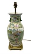 Oriental table lamp of baluster form decorated with river scene panels