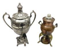 Silver plated samovar raised upon a square plinth on ball feet