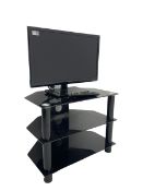 Panasonic 24" television with remote on stand